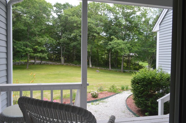 15 Ed Clark Road Hubbardston, MA 01452 - Photo 2 of 19 a view of a wooden deck with a backyard