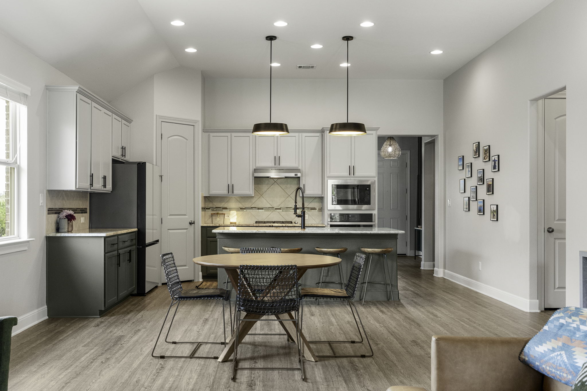 772 Founders Ridge Dripping Springs, TX 78620 - Photo 20 of 40 The kitchen and dining spaces were thoughtfully designed to support effortless entertaining and daily functionality.