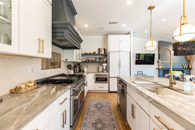 a living room with furniture fireplace and a flat screen tv