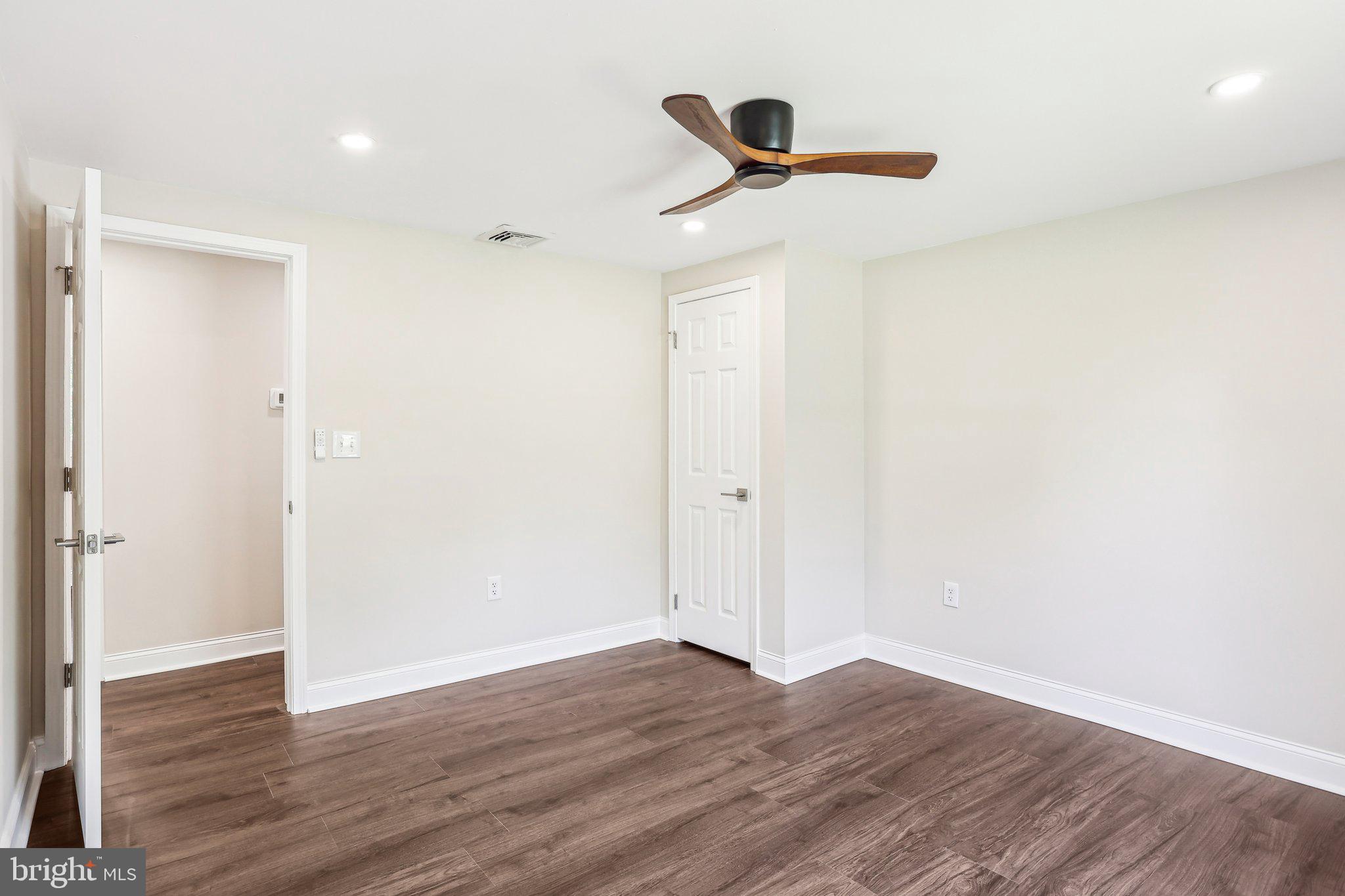 302 Fenwick Road Pilesgrove, NJ 08098 - Photo 26 of 51 a view of empty room with wooden floor