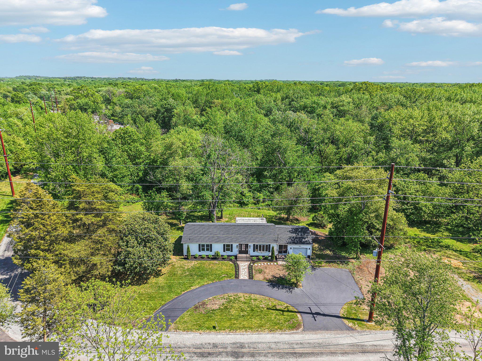 302 Fenwick Road Pilesgrove, NJ 08098 - Photo 42 of 51 a view of a garden with an outdoor space