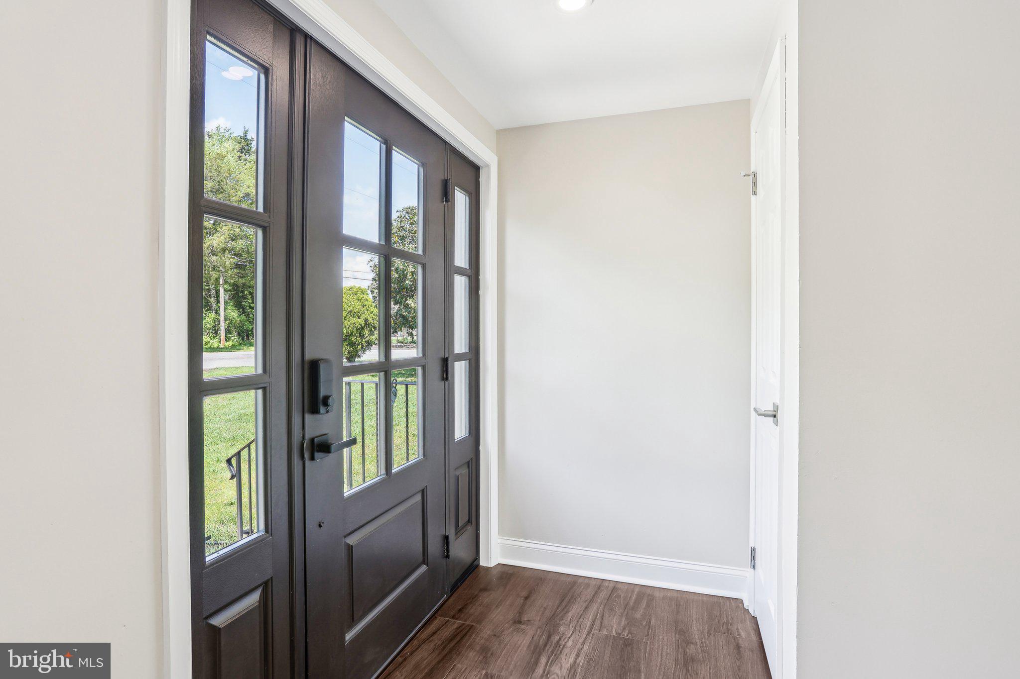 302 Fenwick Road Pilesgrove, NJ 08098 - Photo 6 of 51 a view of entryway with wooden floor