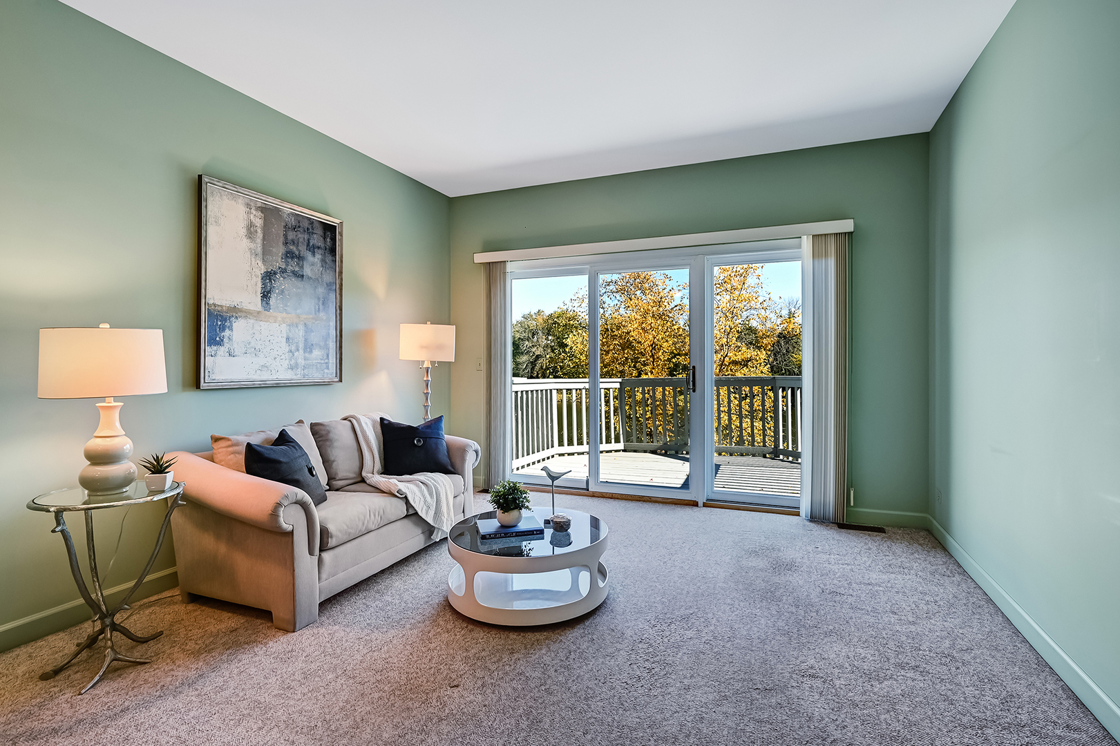 110 Waterside Place Burr Ridge, IL 60527 - Photo 13 of 44 a living room with furniture and a large window
