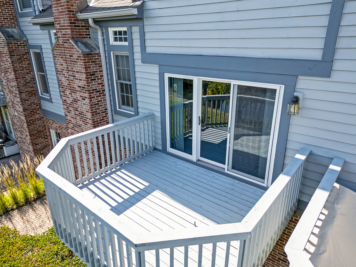 110 Waterside Place Burr Ridge, IL 60527 - Photo 26 of 44 a view of a wooden chairs on the roof deck