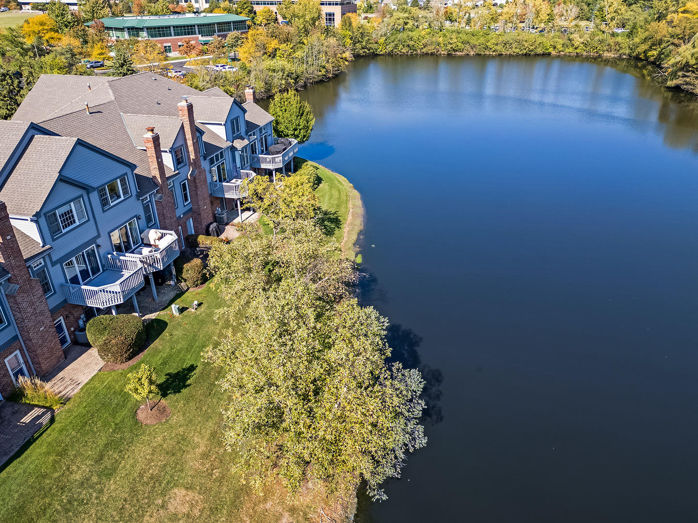 110 Waterside Place Burr Ridge, IL 60527 - Photo 29 of 44 an aerial view of a house with a lake view