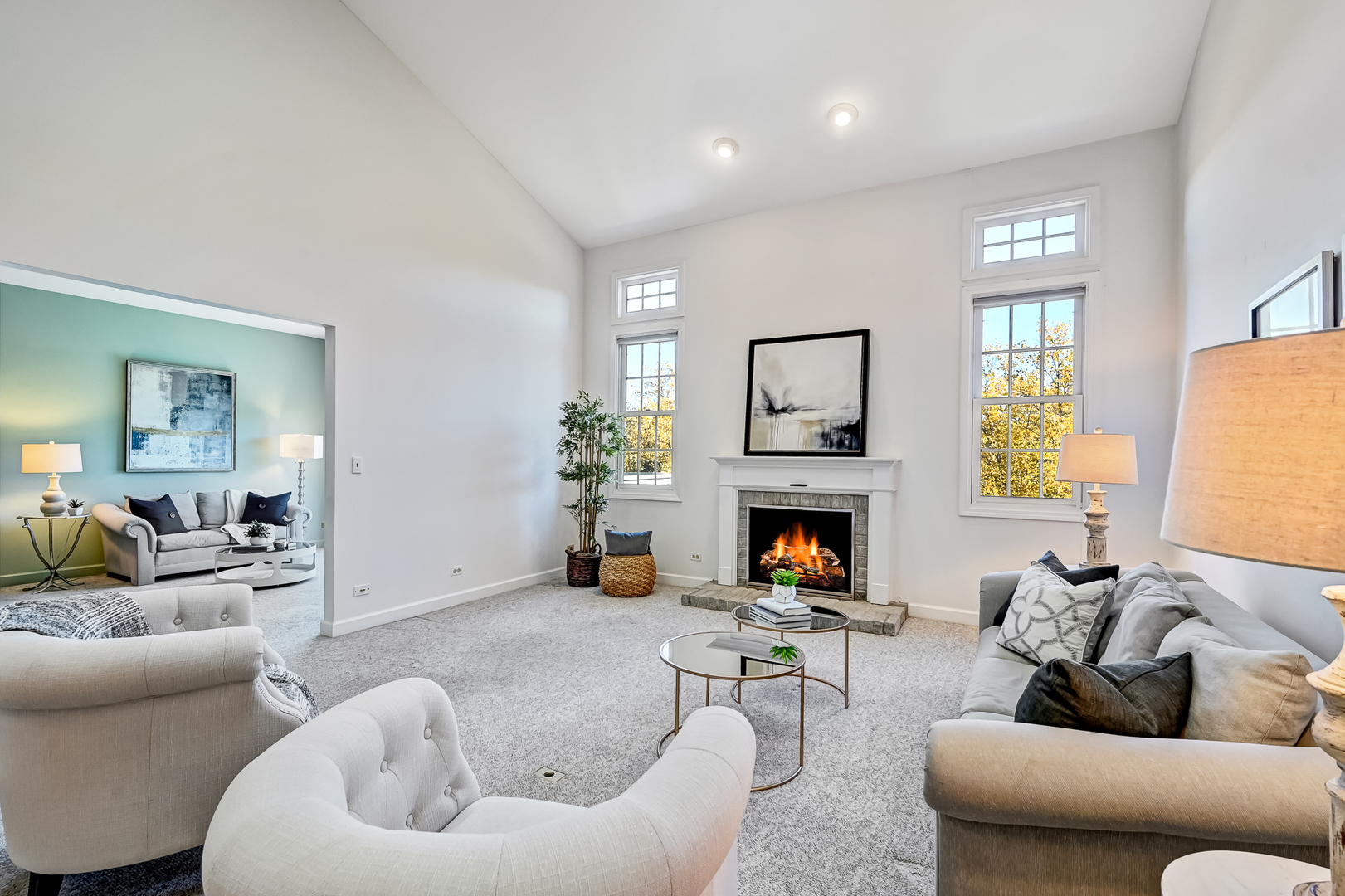 110 Waterside Place Burr Ridge, IL 60527 - Photo 6 of 44 a living room with furniture and a fireplace