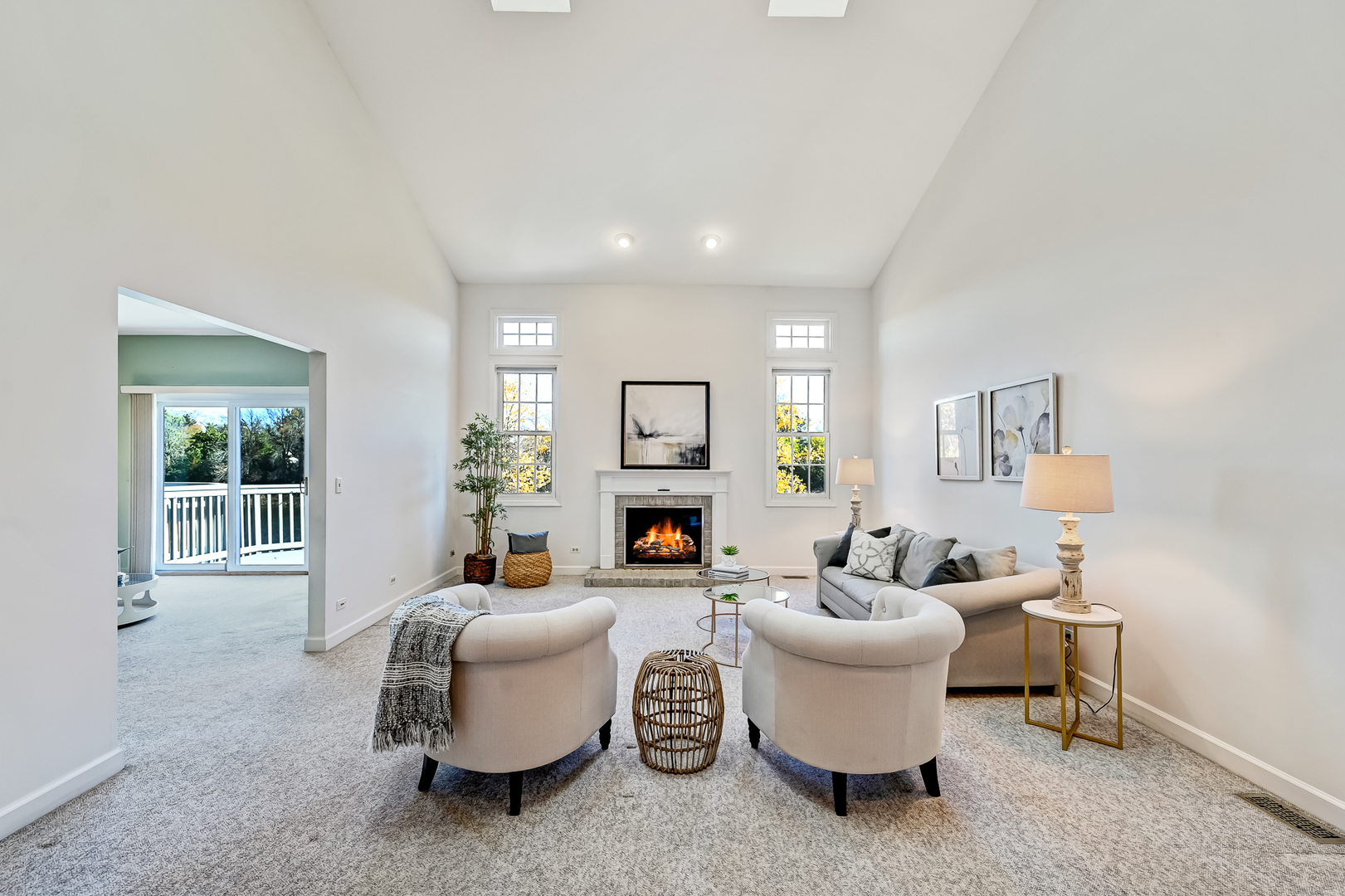 110 Waterside Place Burr Ridge, IL 60527 - Photo 7 of 44 a living room with furniture and a fireplace