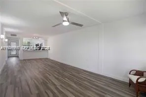 a view of swimming pool with outdoor seating