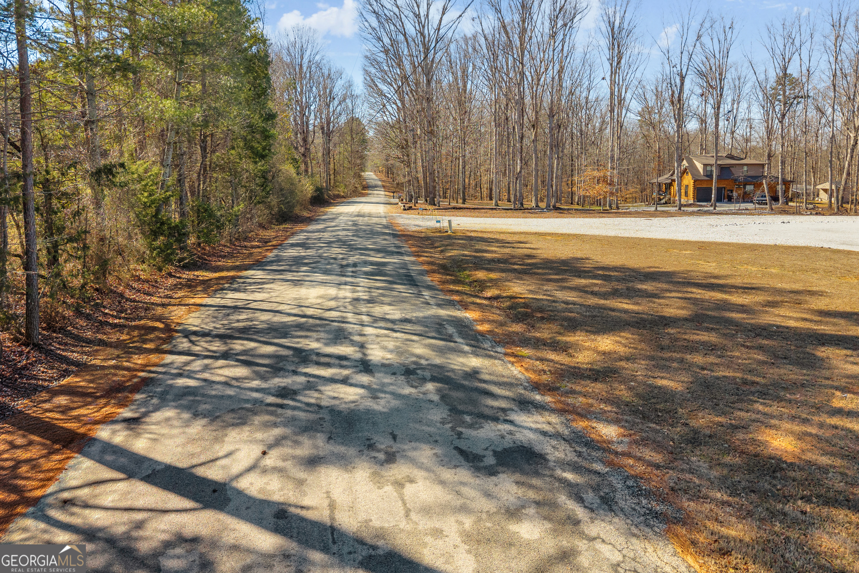 219 Teasley Lane Hartwell, GA 30643 - Photo 7 of 11 a view of road with large trees