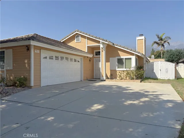 a front view of a house with a garage