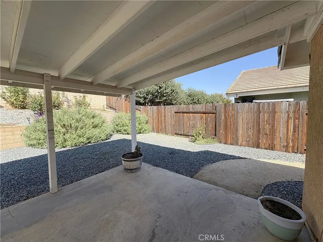 a room with a large bed and large window