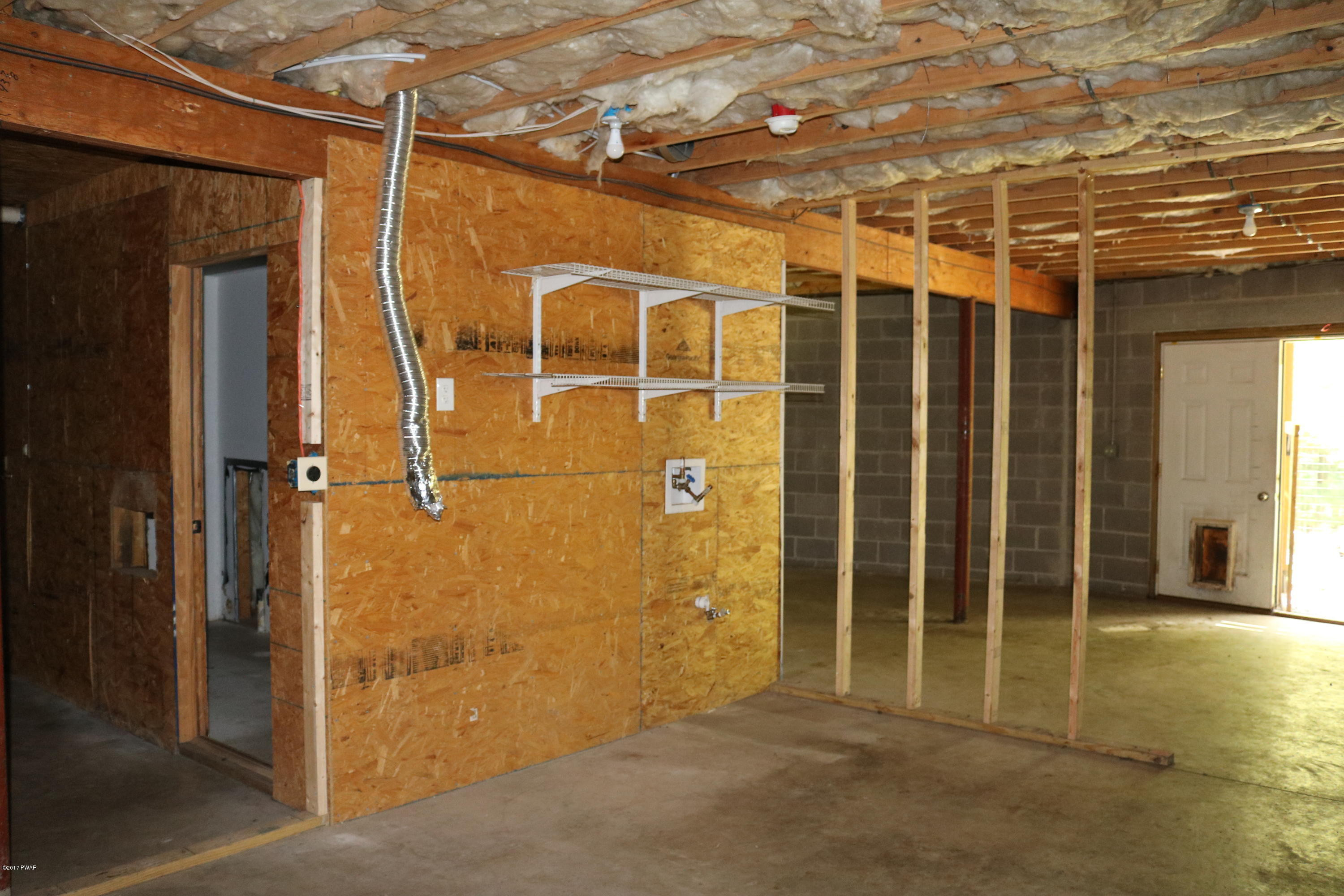 181 Butternut Road Milford, PA 18337 - Photo 24 of 26 a view of a door with wooden walls