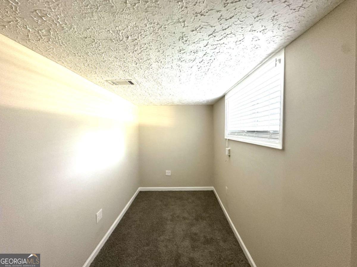3456 Spring Circle Decatur, GA 30032 - Photo 15 of 22 an empty room with a empty space and a window