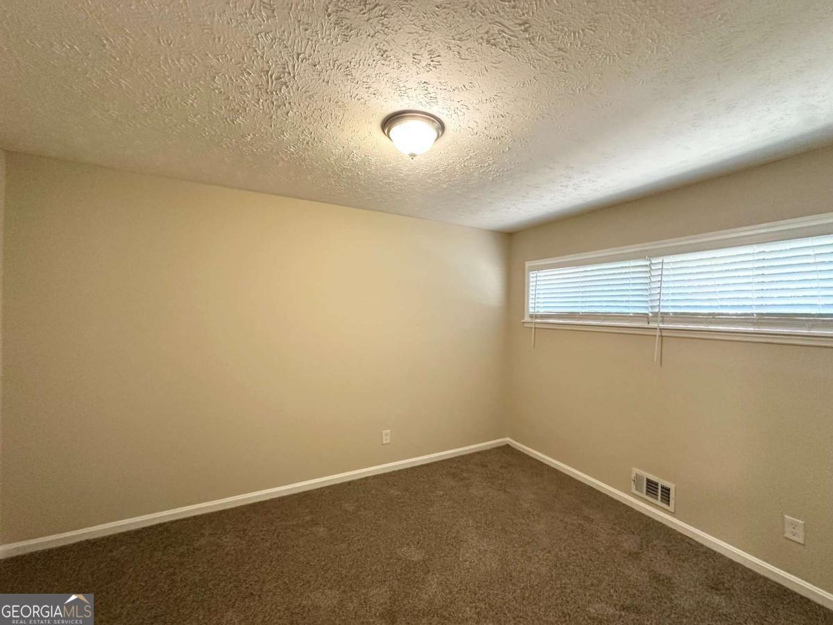 3456 Spring Circle Decatur, GA 30032 - Photo 20 of 22 an empty room with a empty space and a window