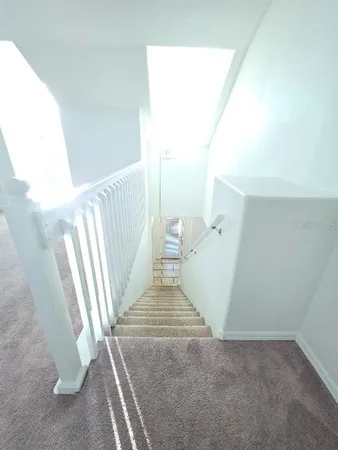 a view of entryway with stairs