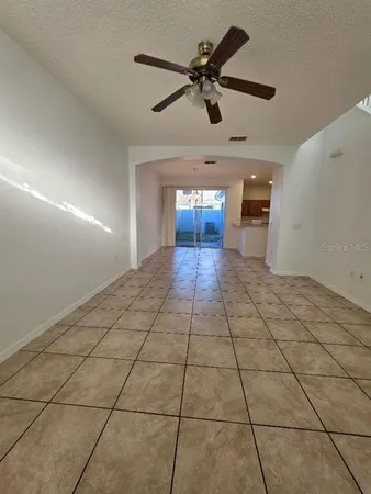 a view of entryway and kitchen