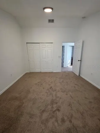 an empty room with an entryway
