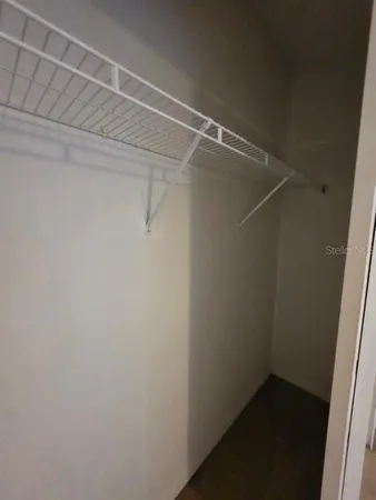 a view of a room with racks on the wall