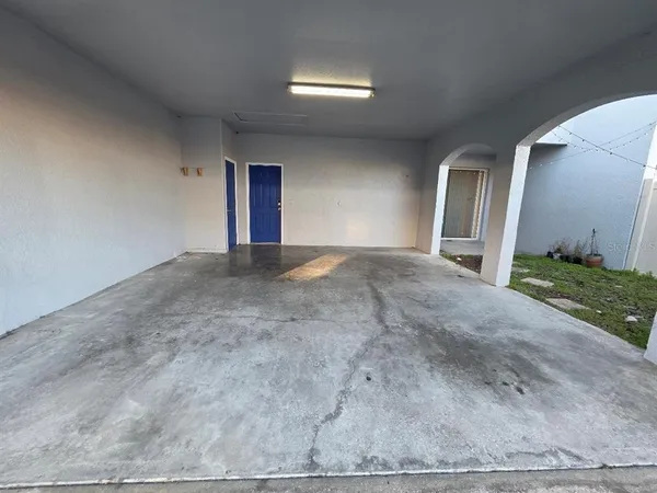 a view of an empty room and window