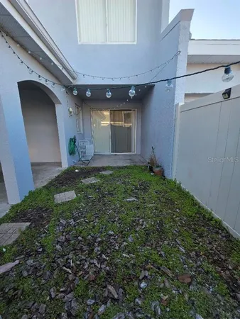 a view of a backyard of a house