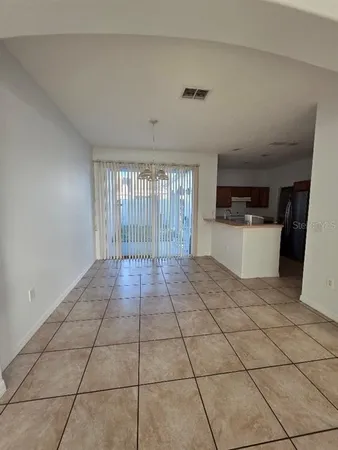 a view of a storage & utility room with a sink