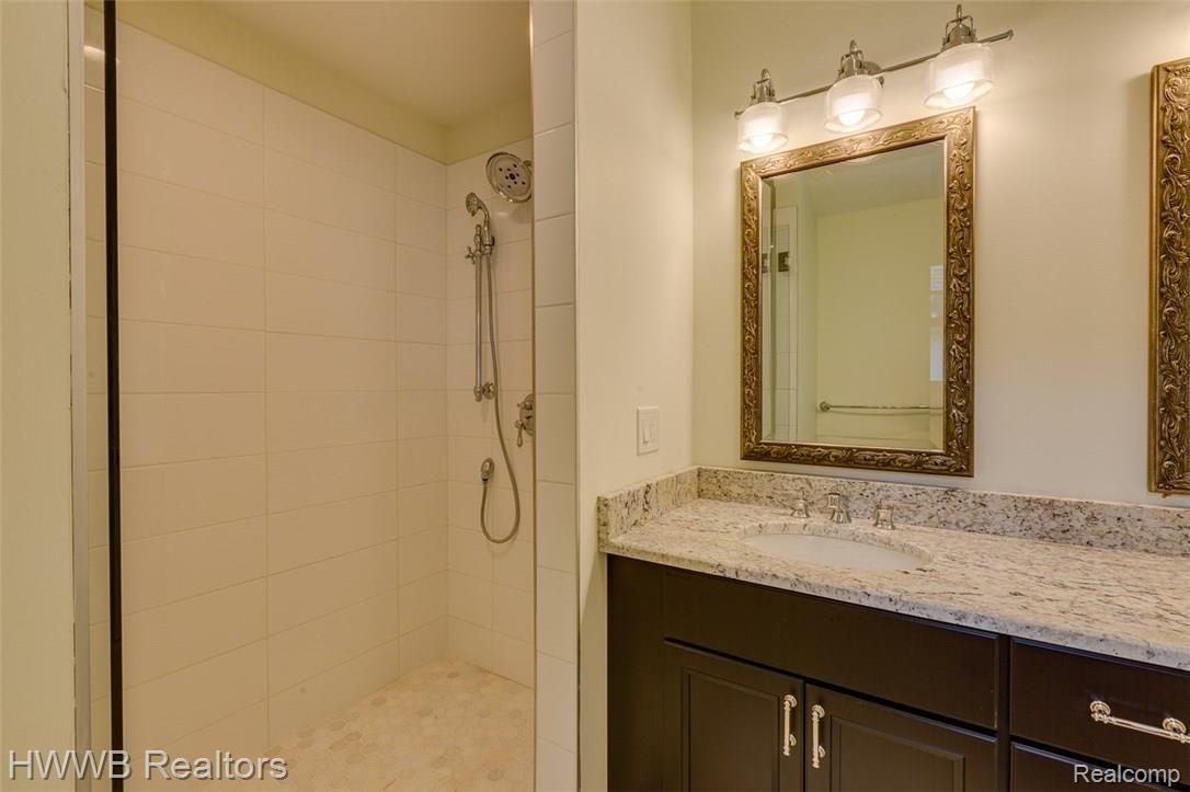 2279 Pembroke Road Birmingham, MI 48009 - Photo 25 of 29 Large euro shower with dual shower heads, with adjustable hand bar
