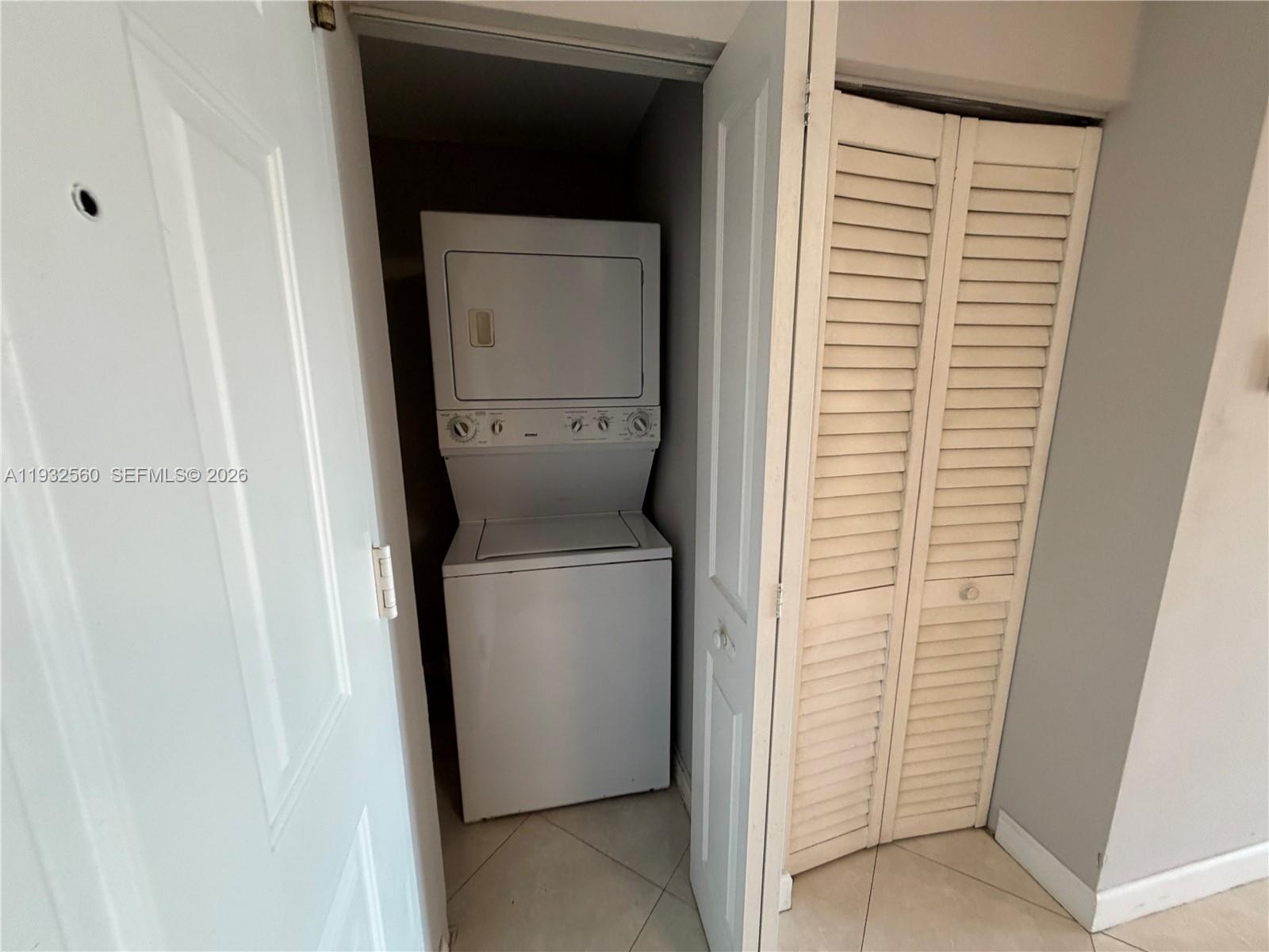 2280 Southwest 32nd Avenue, Unit 216 Miami, FL 33145 - Photo 16 of 34 a utility room with dryer and washer