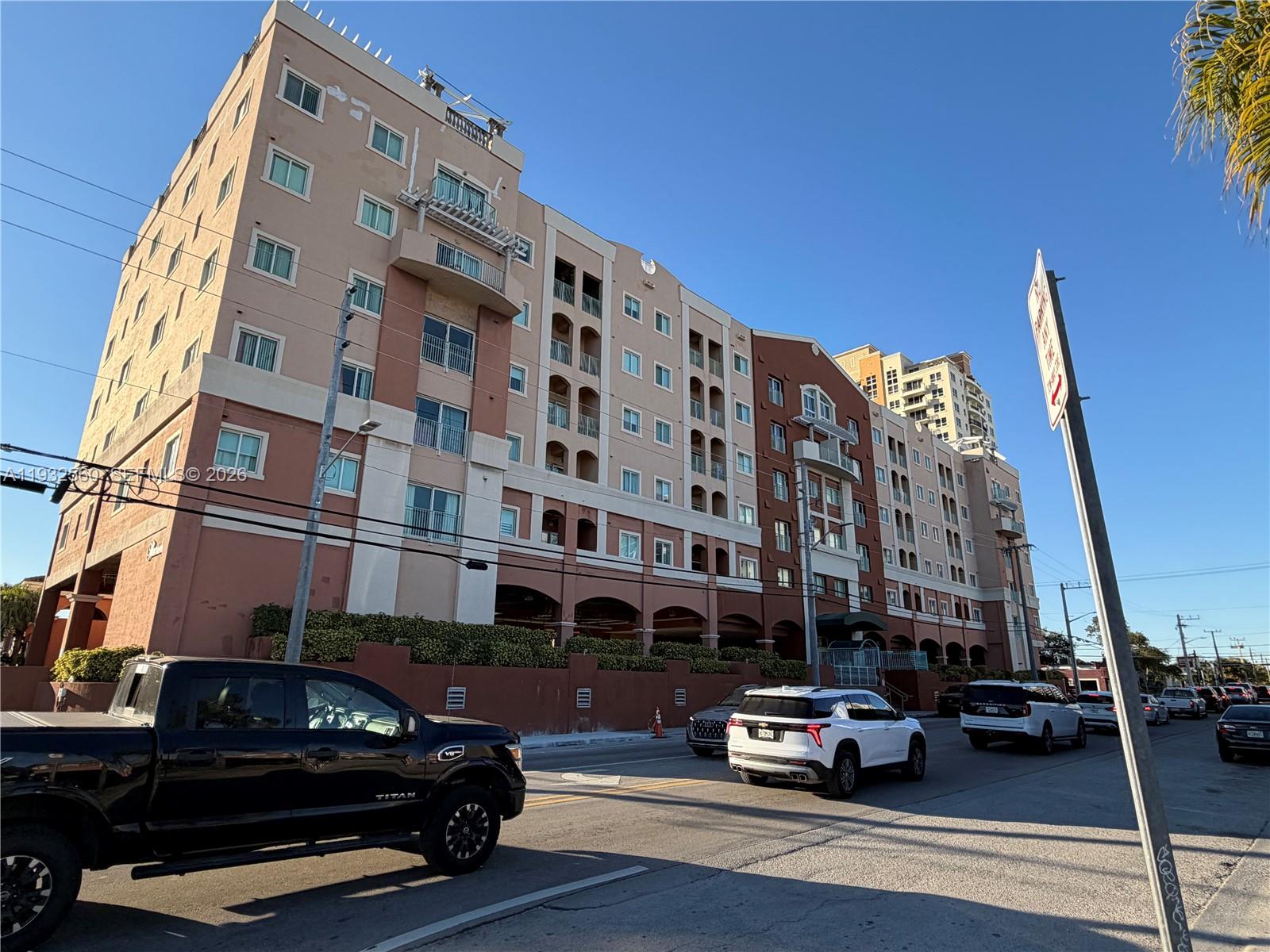 2280 Southwest 32nd Avenue, Unit 216 Miami, FL 33145 - Photo 2 of 34 a car parked in front of a building
