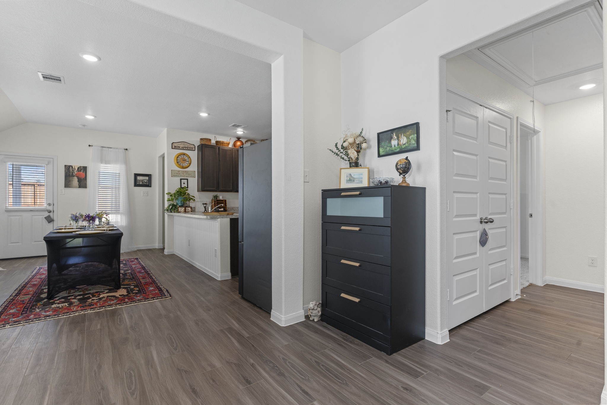 22565 Cormorant Court Splendora, TX 77372 - Photo 11 of 50 a living room with furniture and wooden floor