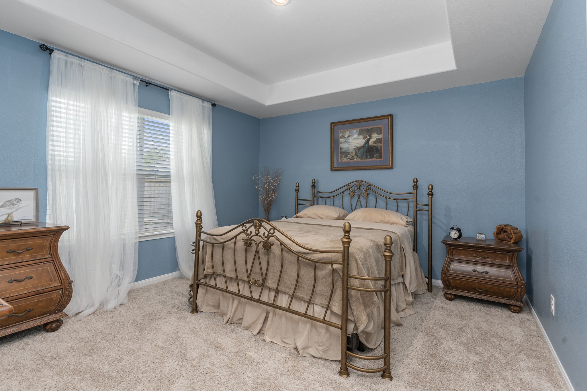 22565 Cormorant Court Splendora, TX 77372 - Photo 23 of 50 a bedroom with a bed and a window