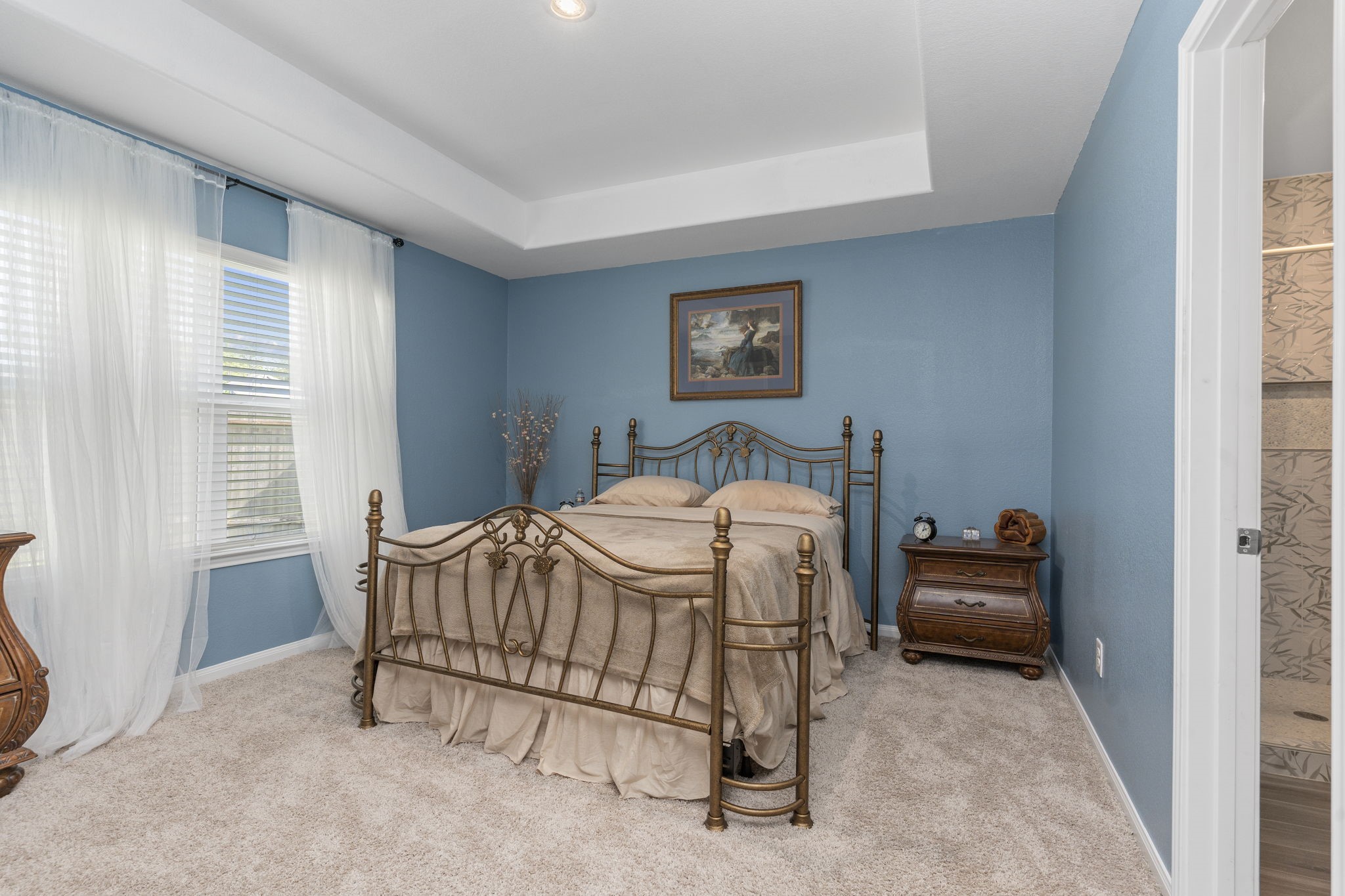 22565 Cormorant Court Splendora, TX 77372 - Photo 26 of 50 a bedroom with a bed and a window