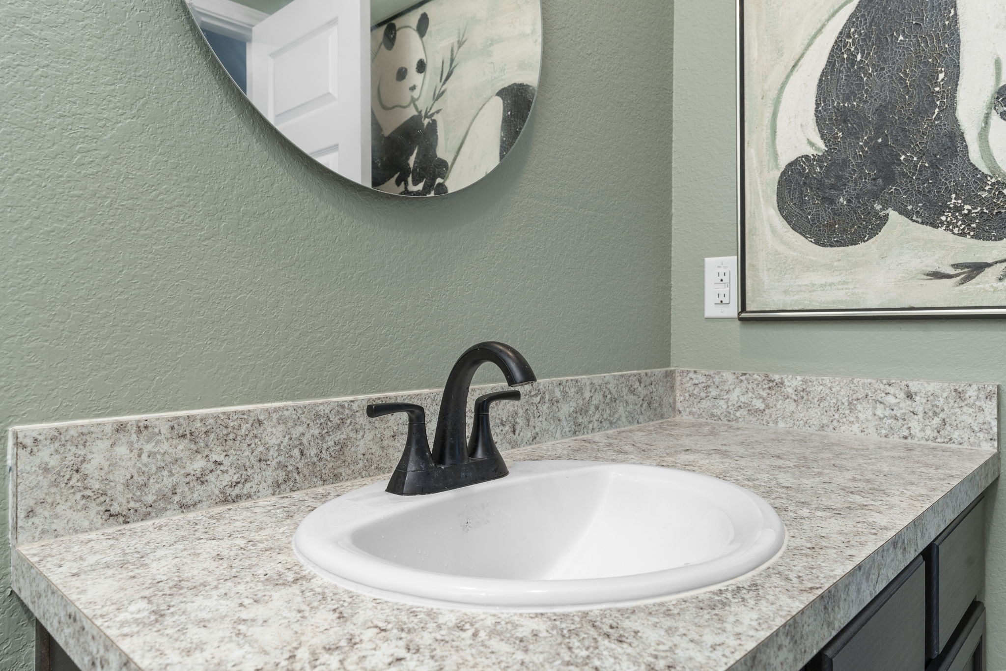 22565 Cormorant Court Splendora, TX 77372 - Photo 28 of 50 a bathroom with a sink and a mirror