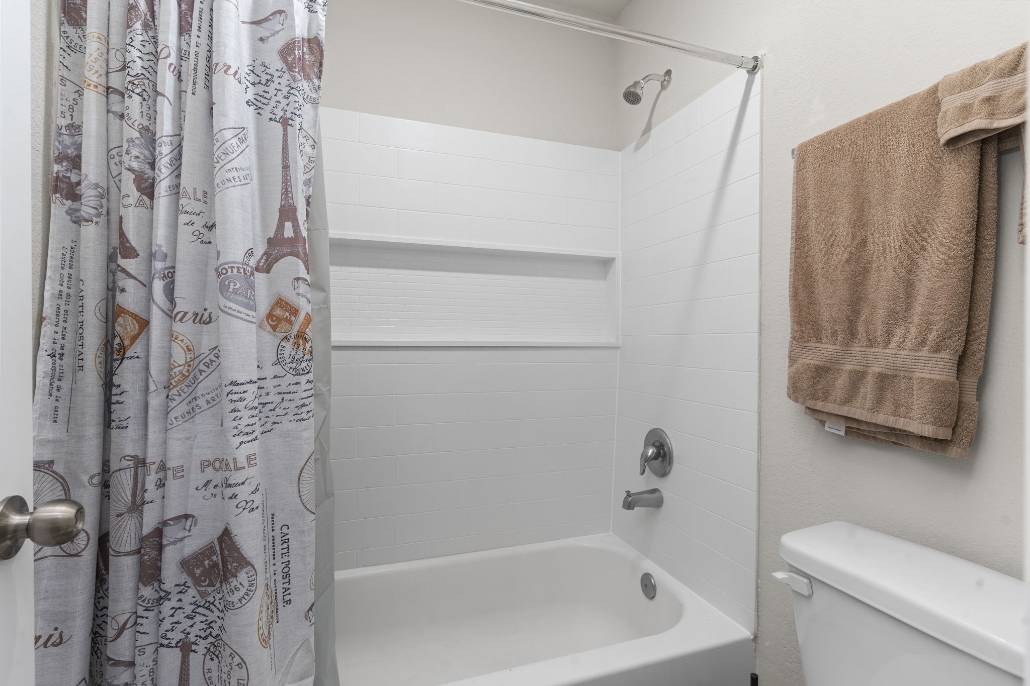 22565 Cormorant Court Splendora, TX 77372 - Photo 35 of 50 a bathroom with a shower curtain and a sink