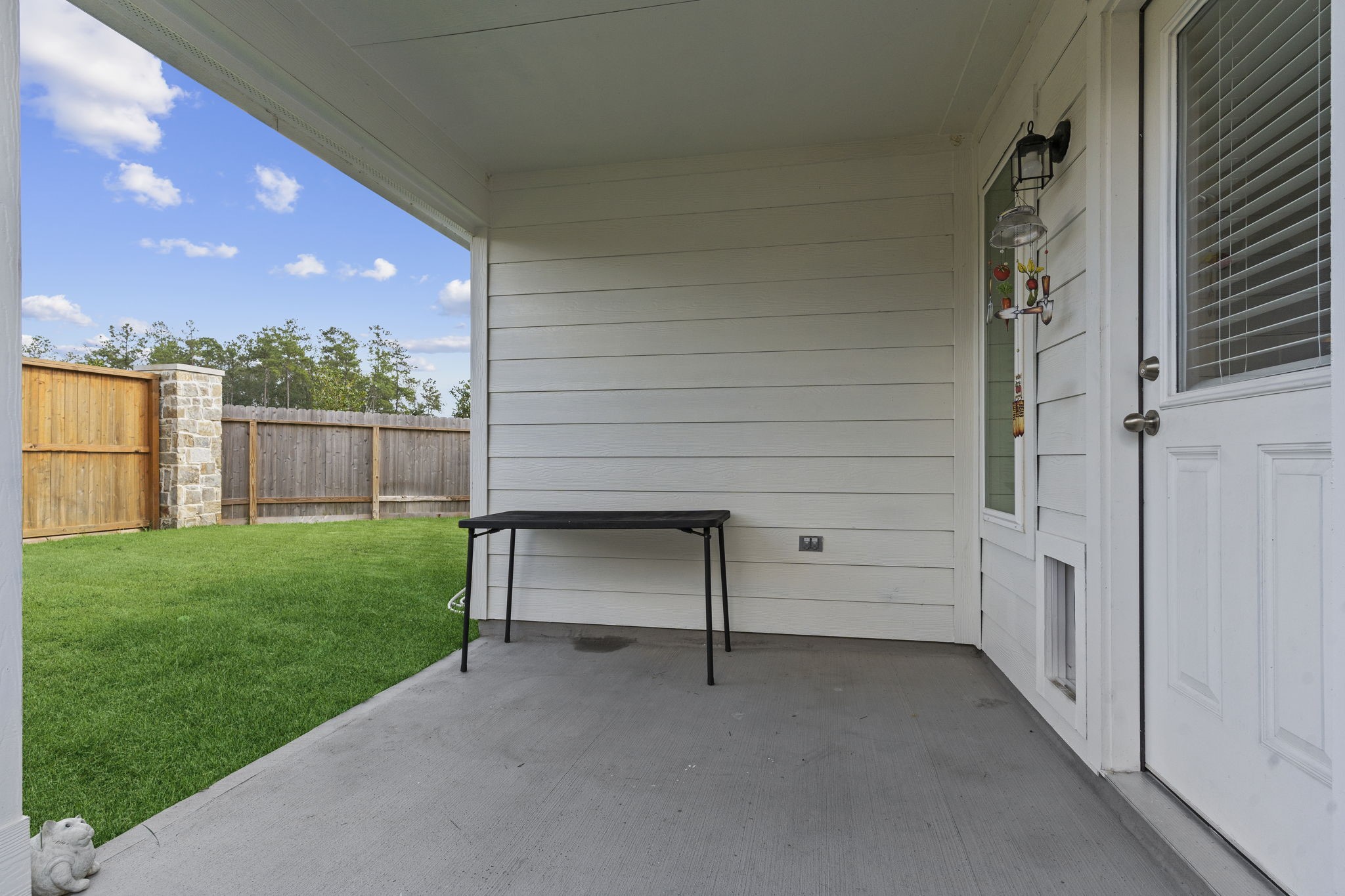22565 Cormorant Court Splendora, TX 77372 - Photo 37 of 50 a view of a bench in the back yard