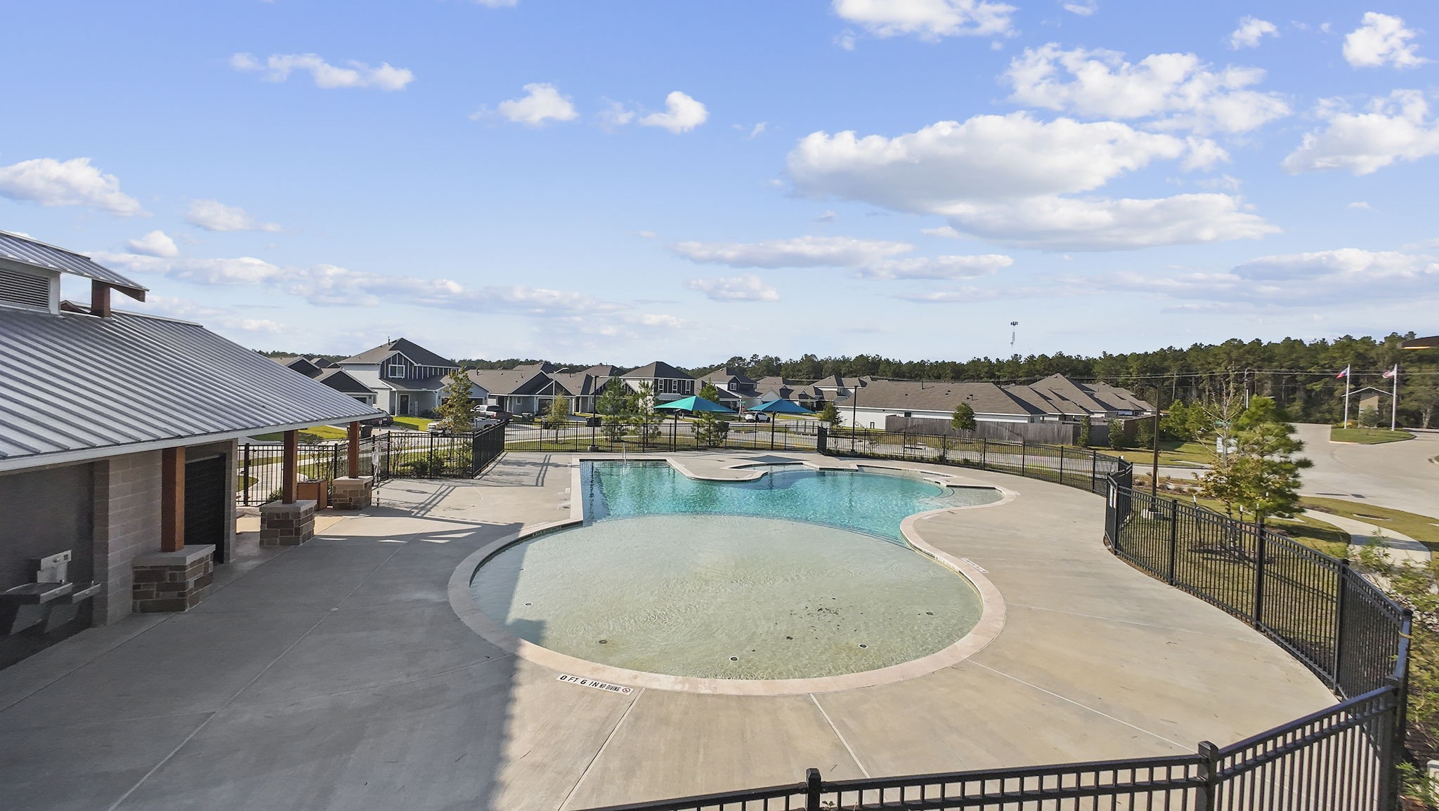 22565 Cormorant Court Splendora, TX 77372 - Photo 38 of 50 a view of a swimming pool and outdoor space