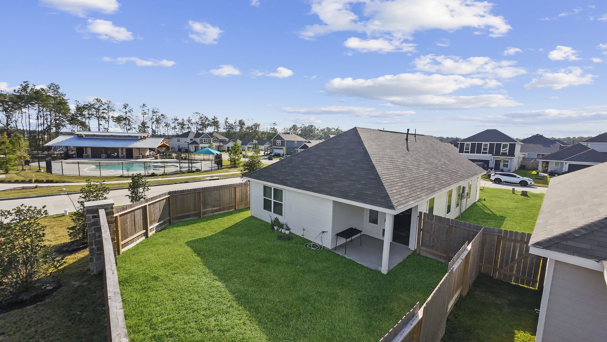22565 Cormorant Court Splendora, TX 77372 - Photo 44 of 50 a view of a house with a yard and sitting area