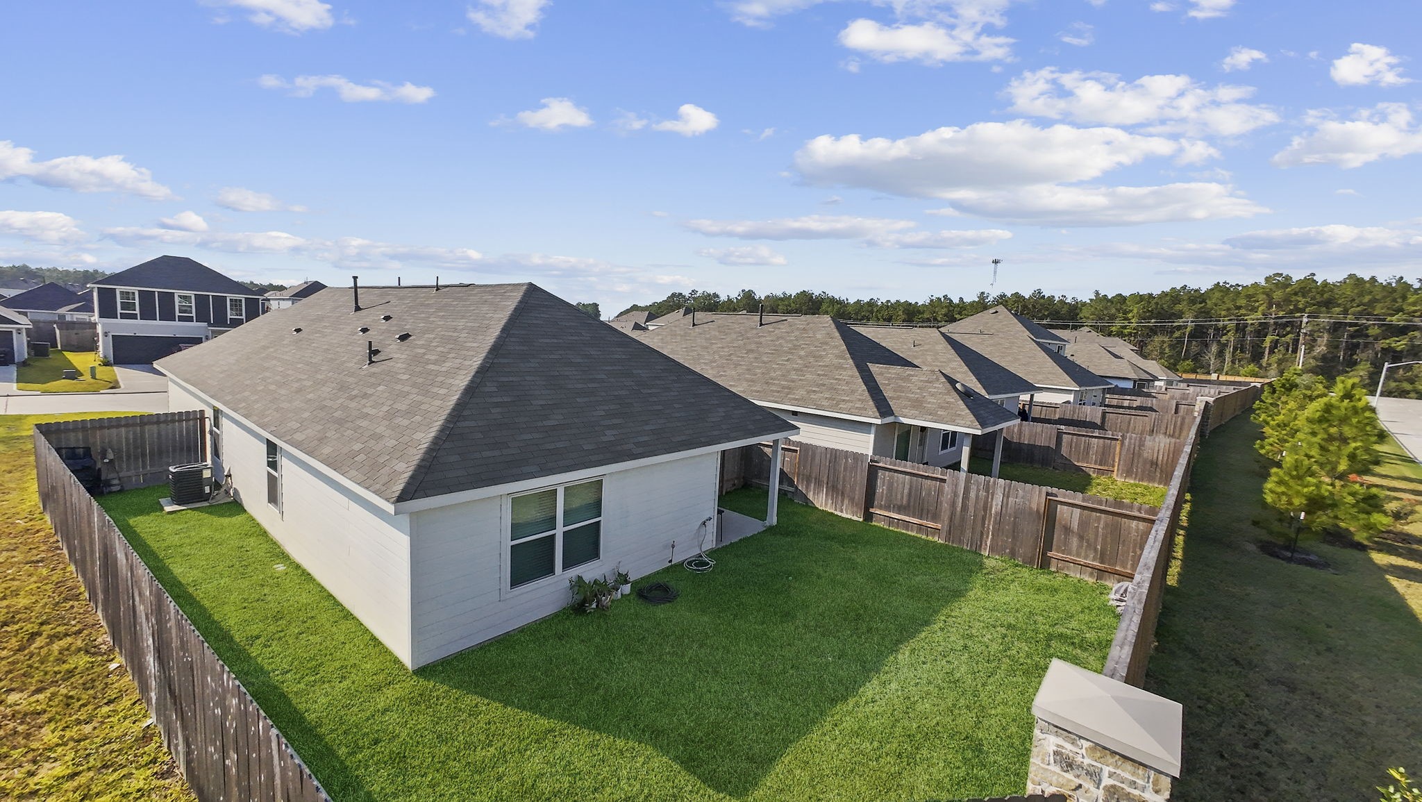 22565 Cormorant Court Splendora, TX 77372 - Photo 50 of 50 an aerial view of a house with a big yard