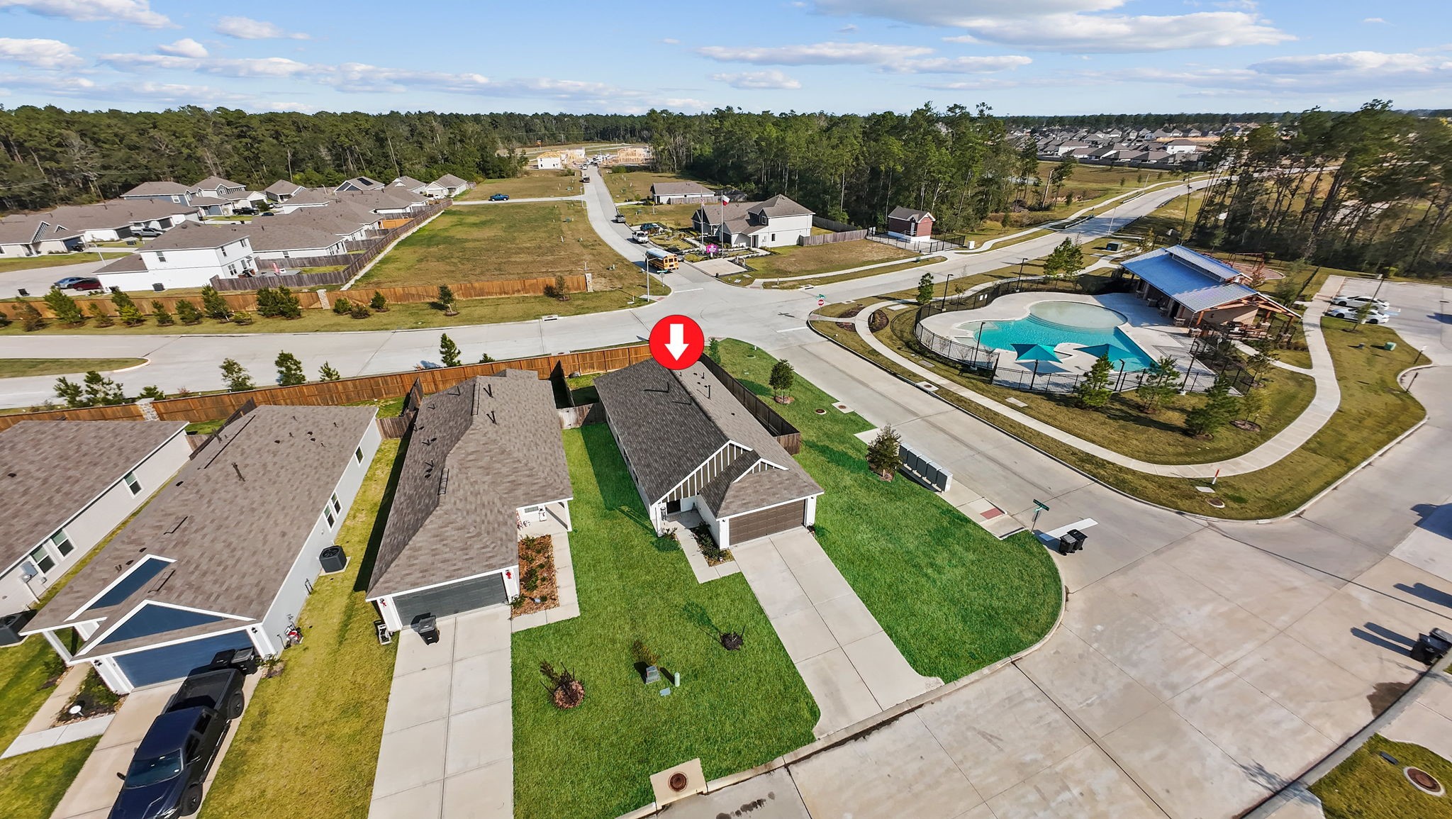 22565 Cormorant Court Splendora, TX 77372 - Photo 5 of 50 an aerial view of a house with a garden and lake view