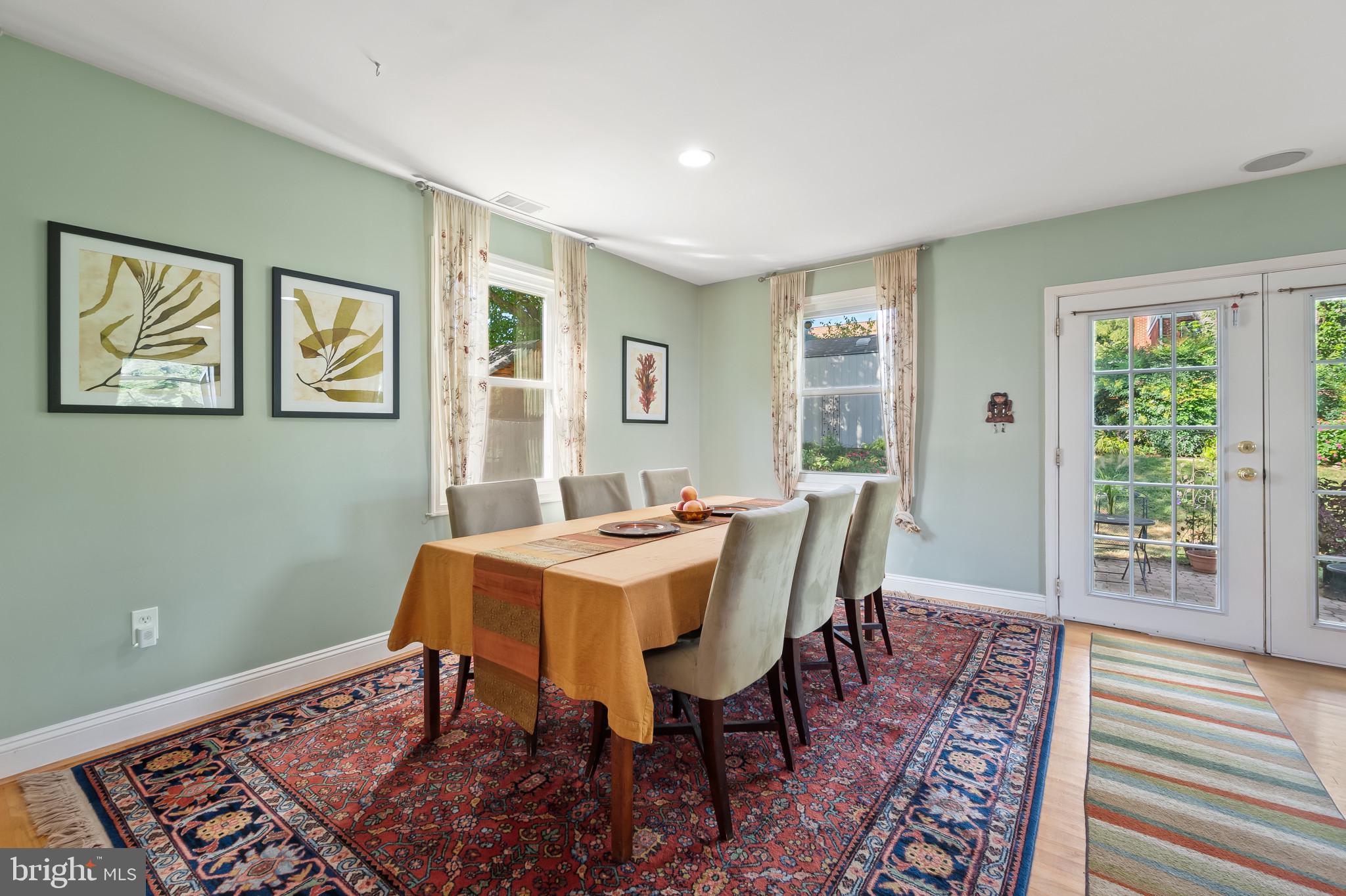 11105 Waycross Way Kensington, MD 20895 - Photo 16 of 35 a view of a dining room with furniture window and wooden floor
