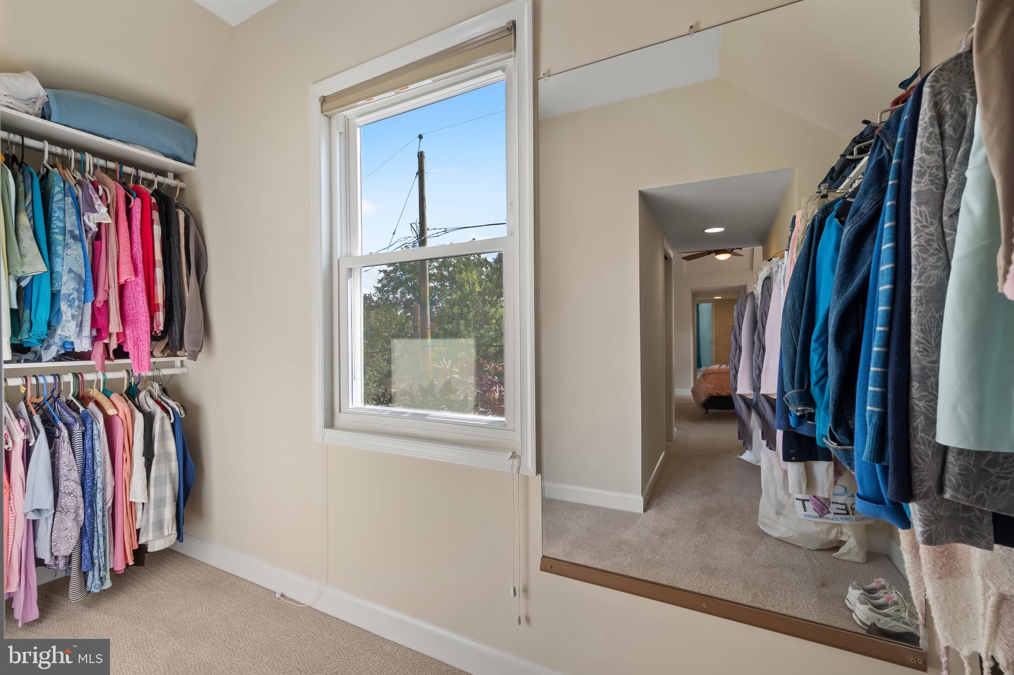 11105 Waycross Way Kensington, MD 20895 - Photo 27 of 35 a view of walk in closet with clothes and shoes