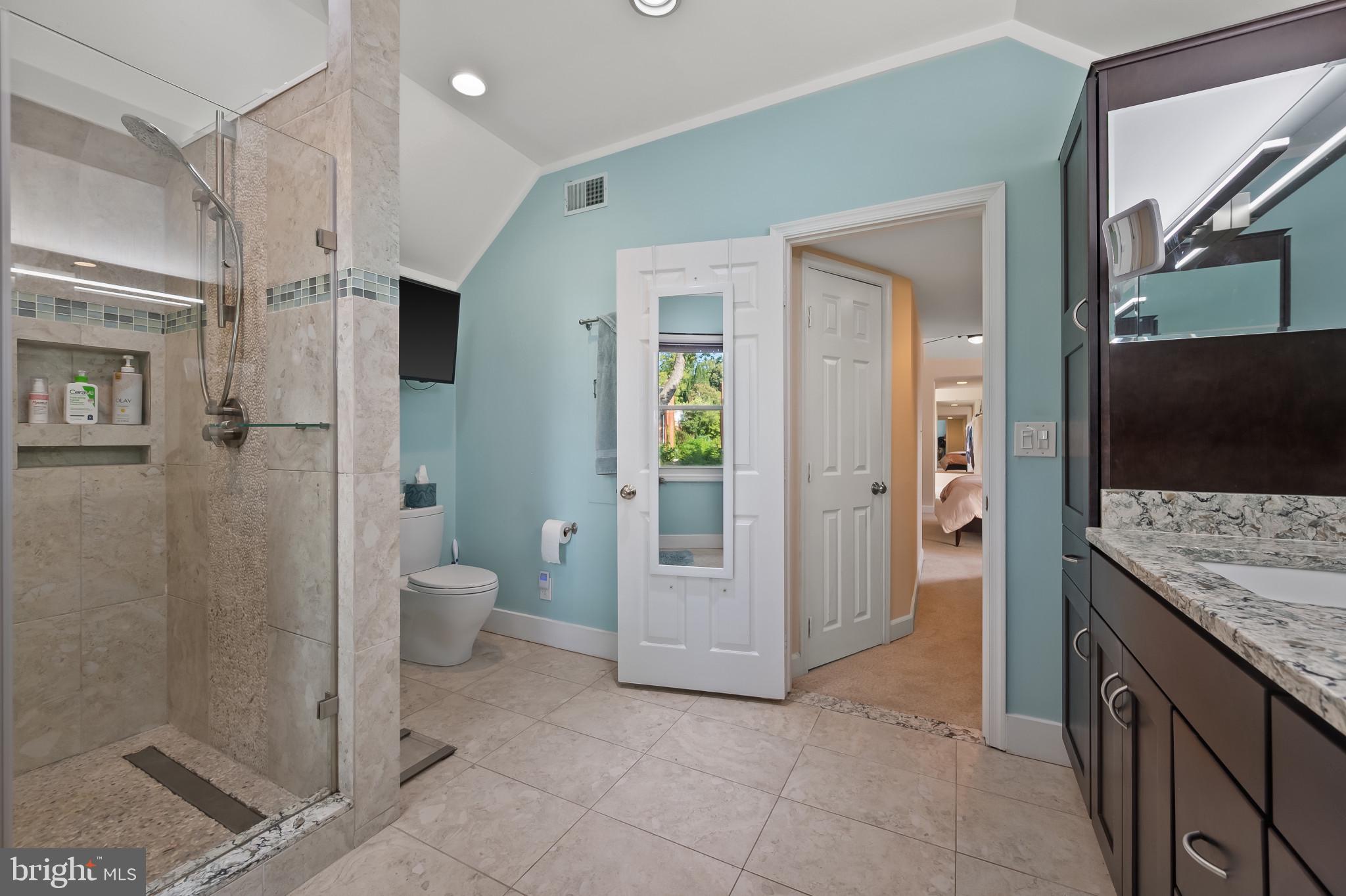 11105 Waycross Way Kensington, MD 20895 - Photo 29 of 35 a bathroom with a granite countertop sink mirror and toilet