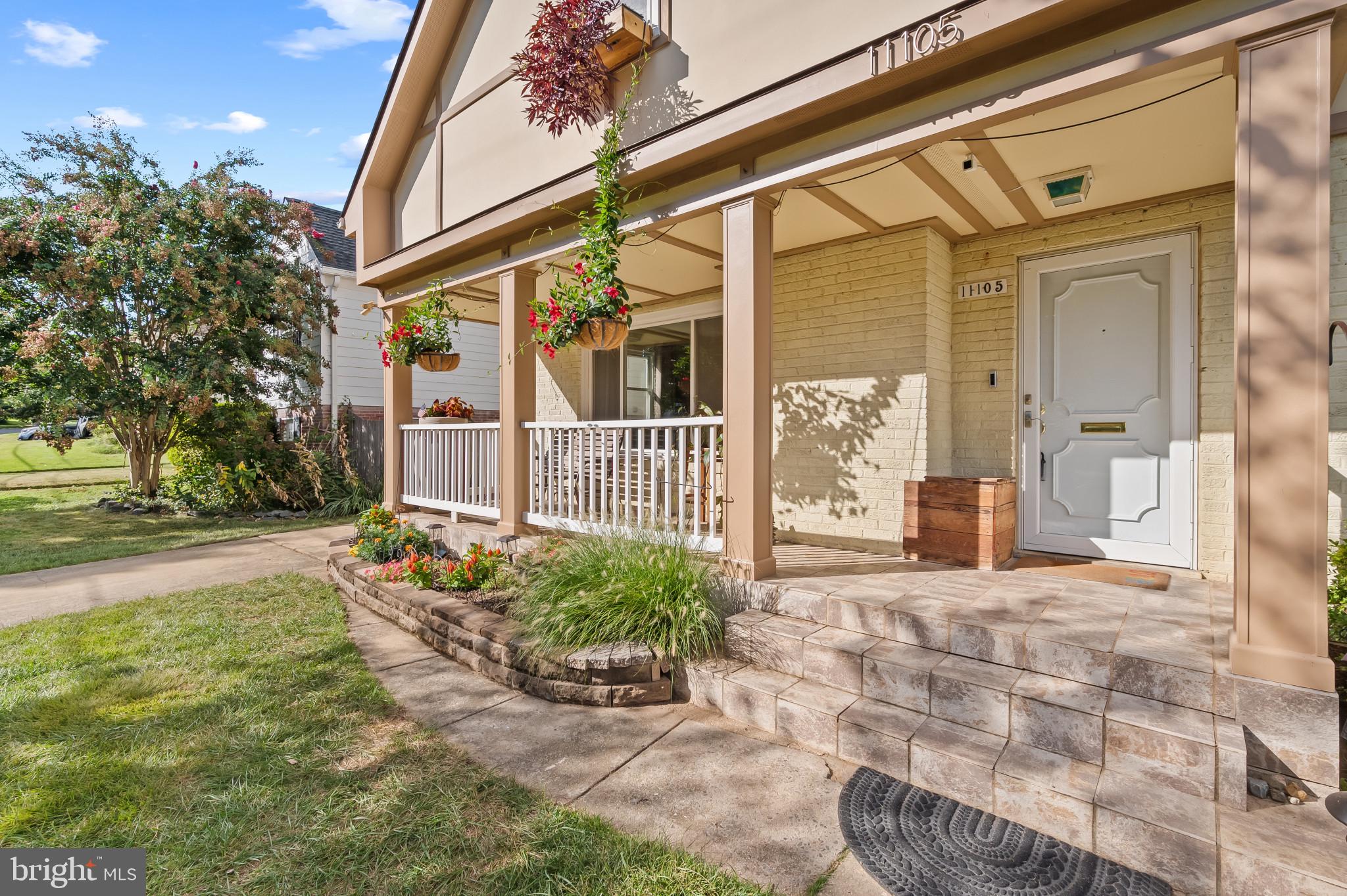 11105 Waycross Way Kensington, MD 20895 - Photo 3 of 35 a view of a house with backyard and garden