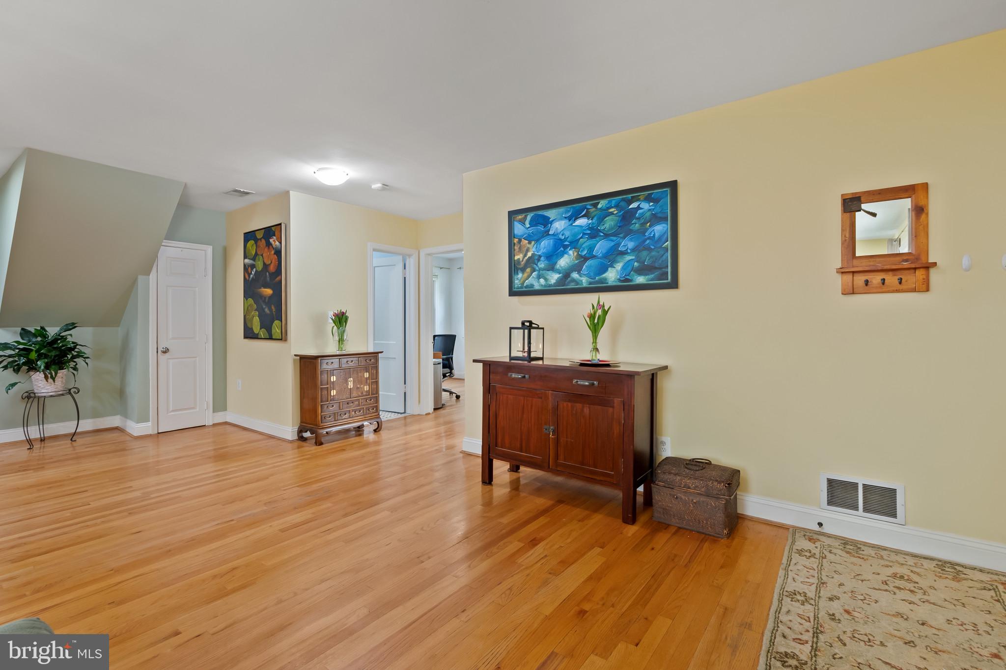 11105 Waycross Way Kensington, MD 20895 - Photo 10 of 35 a room with furniture and wooden floor