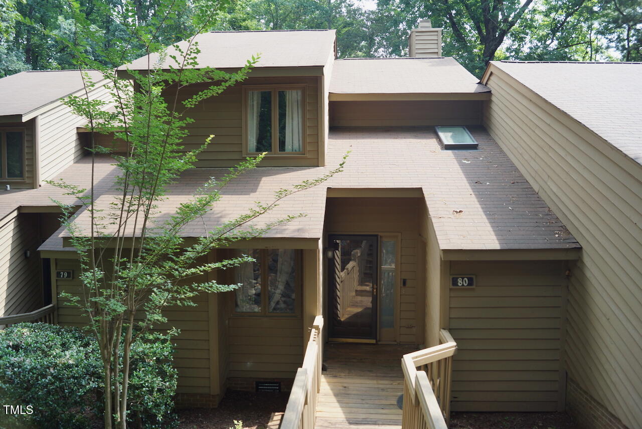 80 Stoneridge Road Durham, NC 27705 - Photo 2 of 27 a view of a house with a yard