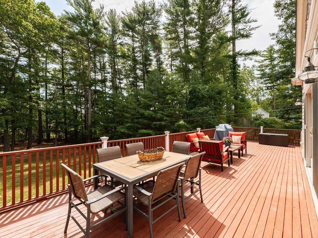 17 Gardner Road Duxbury, MA 02332 - Photo 6 of 42 a balcony with wooden floor and outdoor seating