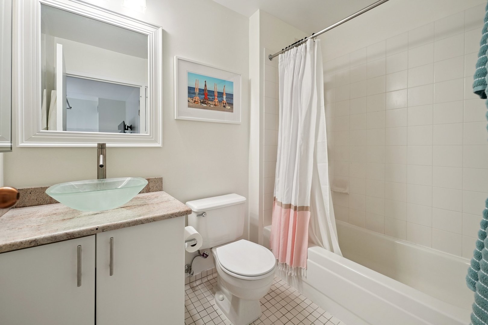 401 East Ontario Street, Unit 2506 Chicago, IL 60611 - Photo 11 of 12 a bathroom with a granite countertop sink toilet and shower