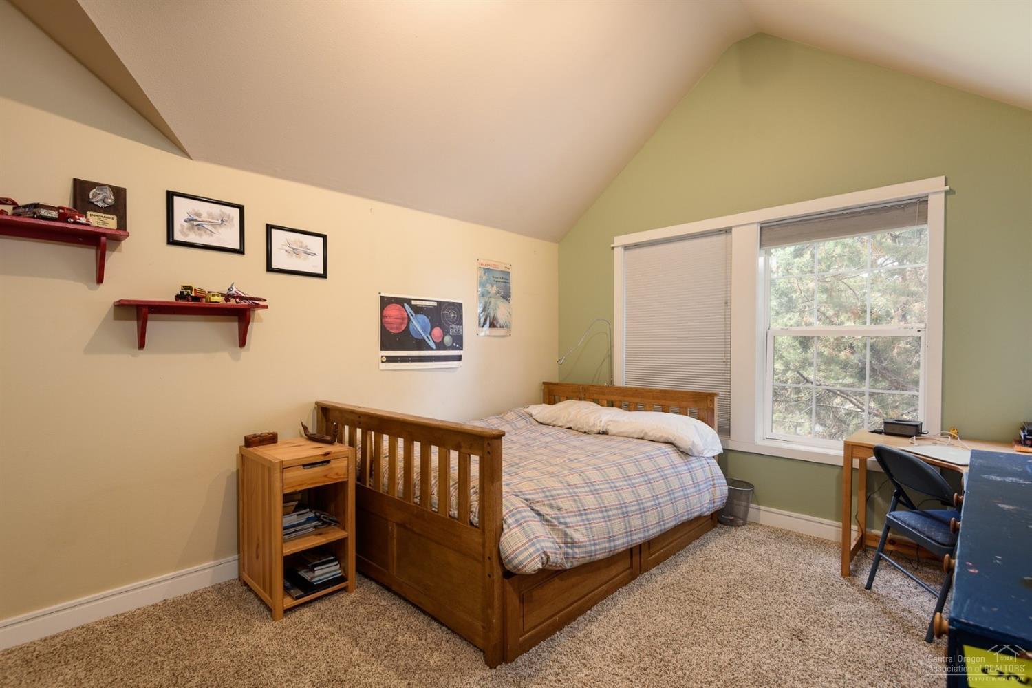 3802 Northwest Summerfield Road Bend, OR 97703 - Photo 16 of 25 One of 3 upper level guest rooms.