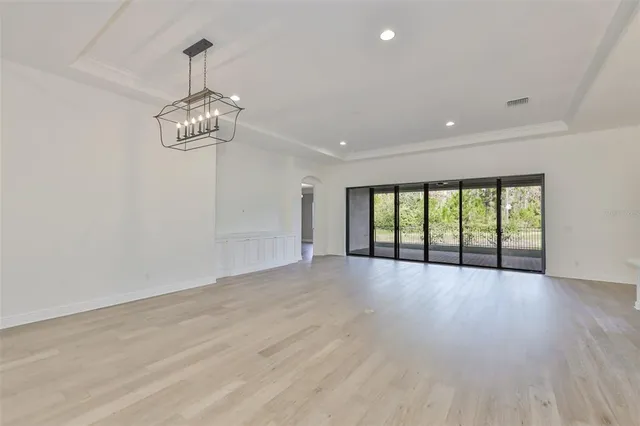 a kitchen that has a lot of cabinets in it
