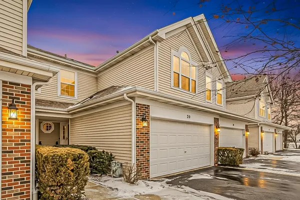 a view of a house with a street