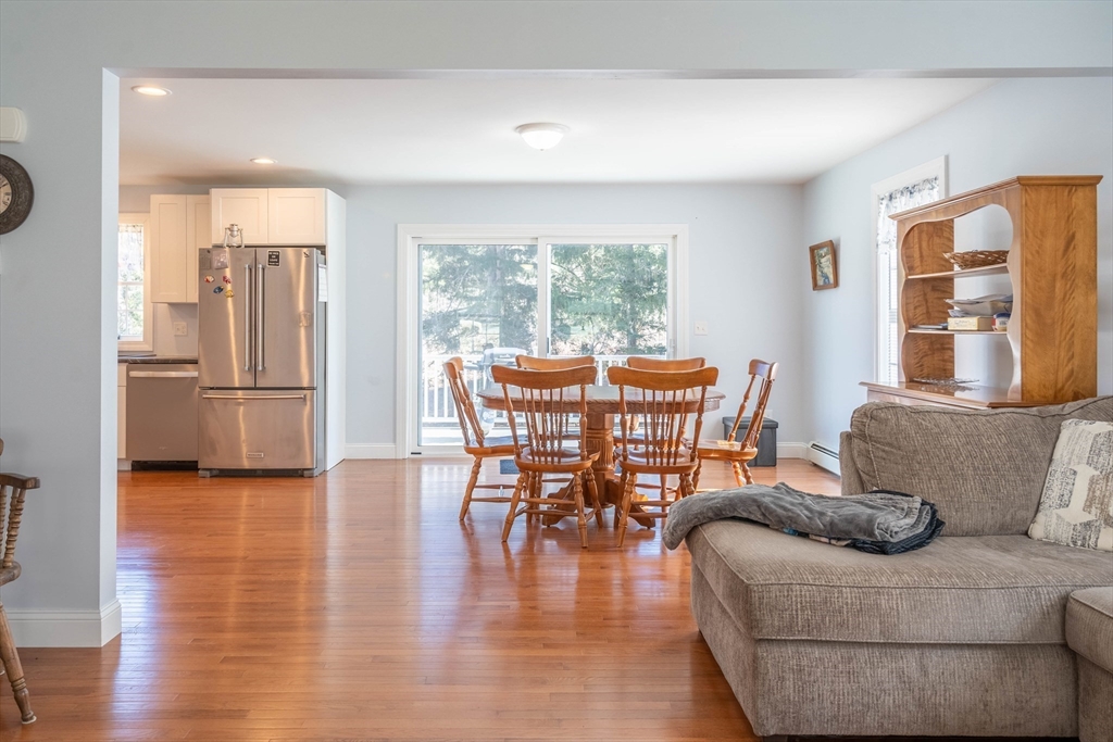 521 Brimfield Road Warren, MA 01083 - Photo 7 of 41 a living room with furniture and a large window